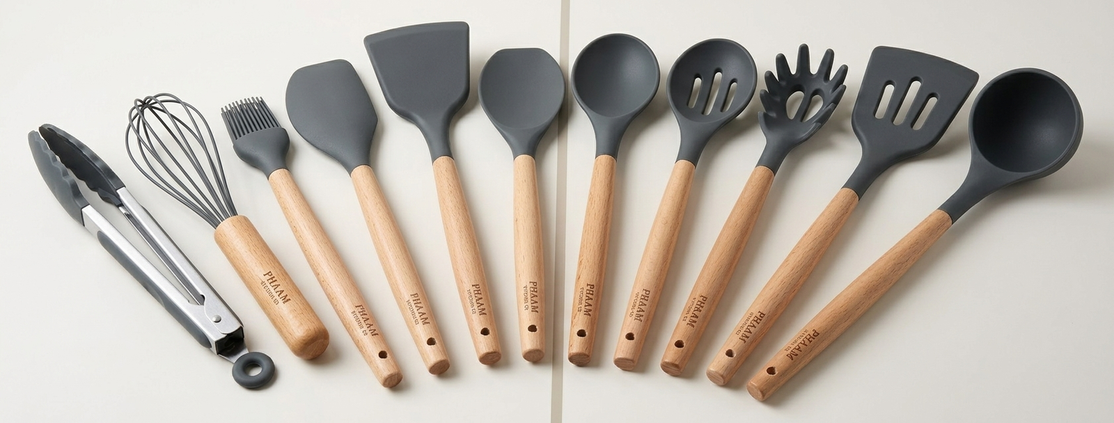 All twelve PHAAM utensils laid flat side by side